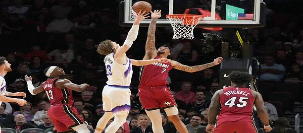 Wiggins scored 26 points in a losing effort as the Jazz narrowly defeated the Heat 115-111.