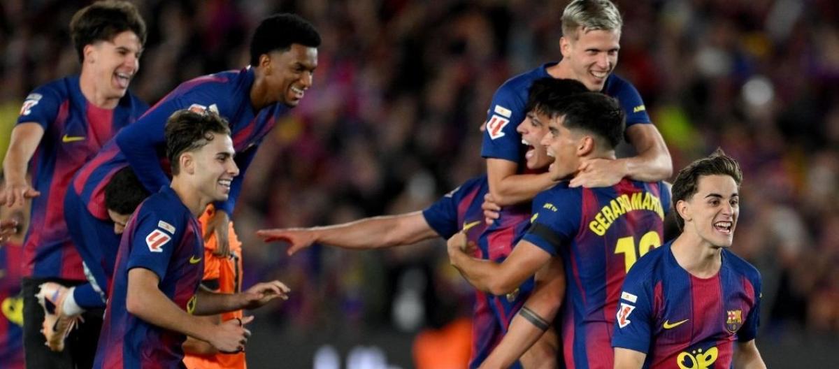 La Liga – Barcelona 2-0 defeat Real Madrid to secure the title with three rounds to spare.