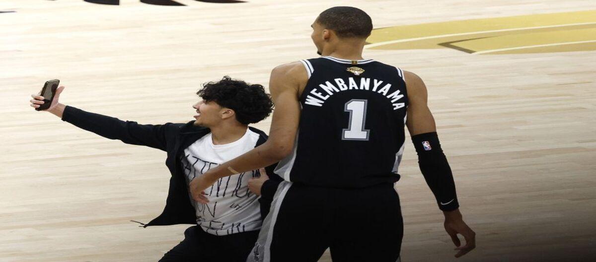 Fans rushed onto the court to take selfies with Wimbledon and Amazon; NBA announces lifetime ban.