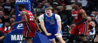 Flagg scored 22 points as the Mavericks defeated the Heat 118-108.