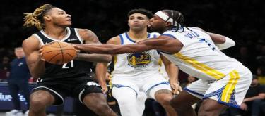 Curry scored 27 points as the Warriors defeated the Nets 120-107.