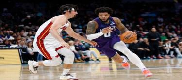 With Ball scoring 30 points and White adding 24, the Hornets defeated the Heat 136-106.