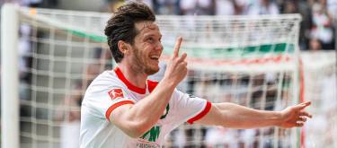 Augsburg have announced that they have triggered Michael Gregoritsch's buy-out option, extending the player's contract until the summer of 2027.